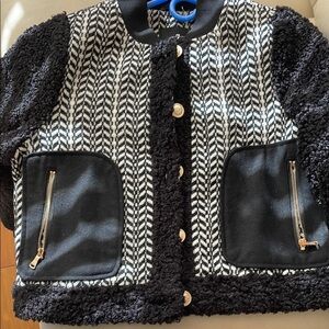 Stylish Black and White womens jacket from 7 for all
Mankind. New